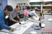 爻卦在线两岸艺术家在安徽“共绘一幅画”